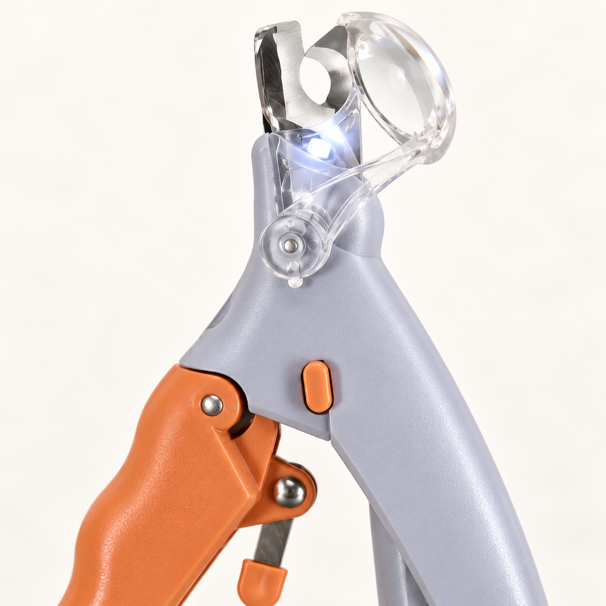 Close-up of the clipper cutting head, LED and clear magnifying lens